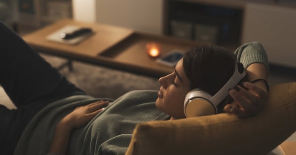 Woman sleeping with headphones